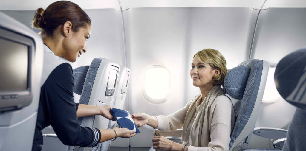 finnair-economy-comfort-longhaul-cabin-attendant-woman_low